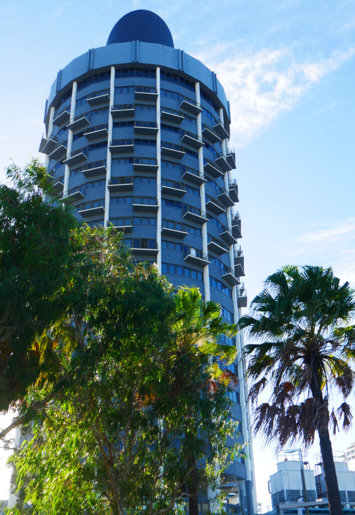 The Sugar Shaker building rising above the trees, Townsville